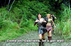 Scene from the show Xena: Warrior Princess where Xena takes off her armor while running and says 'Come on Gabrielle, let's get wet!'