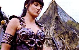 Scene from the show Xena: Warrior Princess where Gabrielle pulls herself up by grabbing Xena's chest